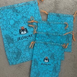 Jellycat Turquoise Bags with Orange Drawstrings